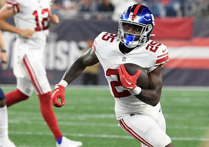 Aug 11, 2022; Foxborough, Massachusetts, USA; New York Giants running back Jashaun Corbin (25) runs after a catch during the second half of a preseason game against the New England Patriots at Gillette Stadium.